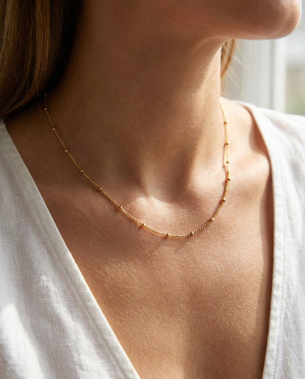 Indie satellite necklace worn