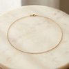 Lumi fine chain necklace flat lay