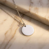 Saint coin pendant